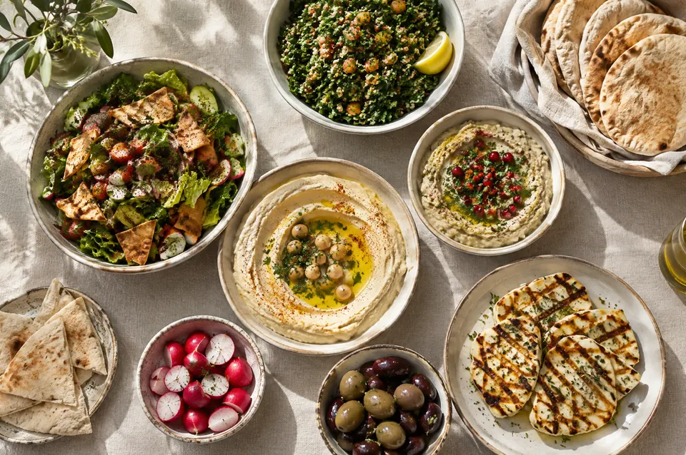 A Lebanese mezze spread with hummus, tabbouleh, fattoush and bread